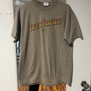 Green and brown Truth Trackers tee